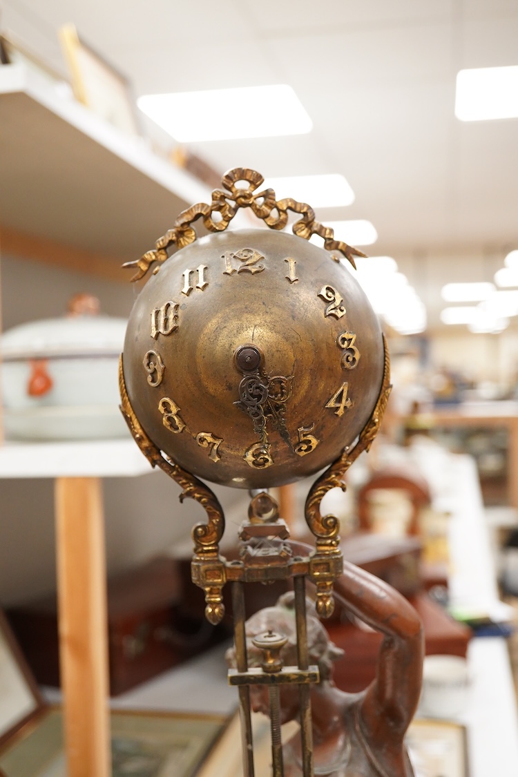 A late 19th century spelter figural mystery clock, 63cm high